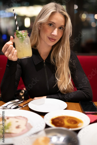 young woman eating a meal