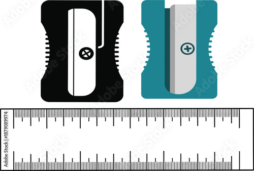 Black and teal pencil sharpeners and ruler with measurement marks blue grey