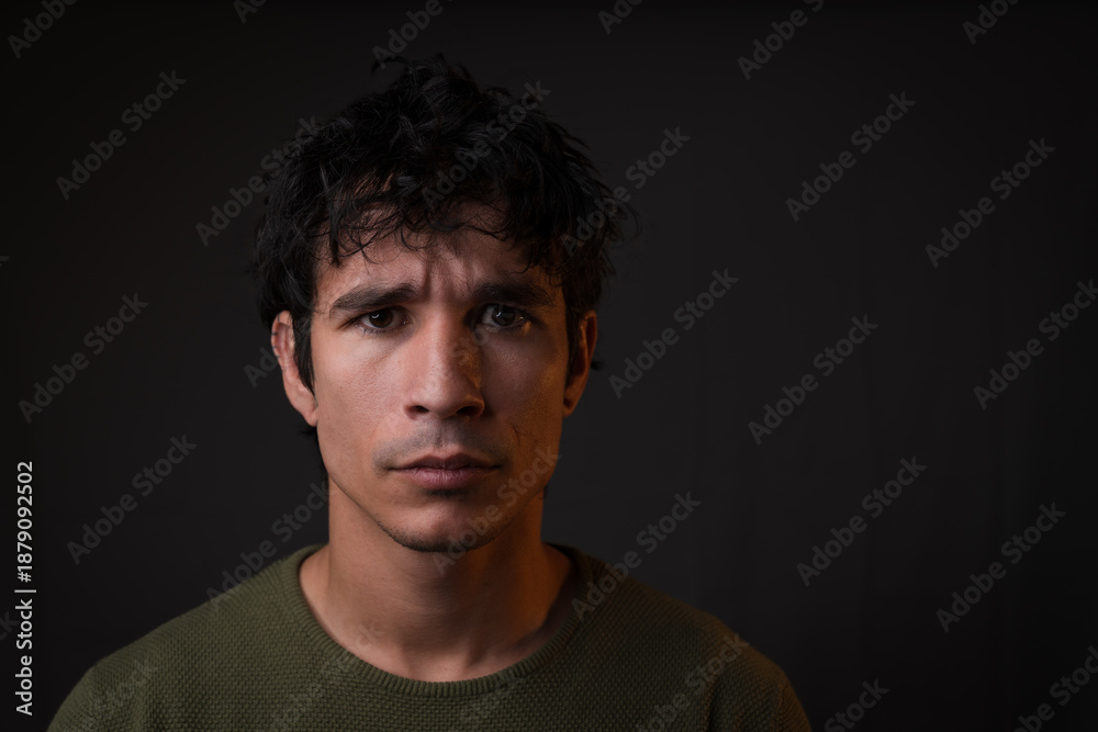 Fototapeta premium Serious and angry young latino man