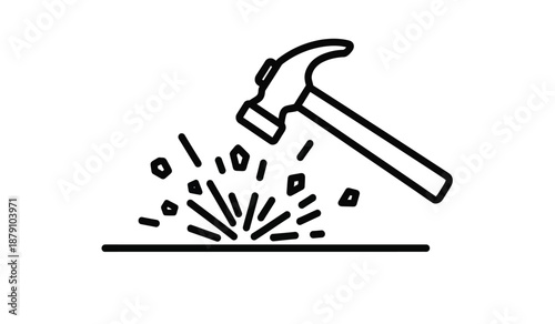 Hammer striking surface causing splintering and fragmentation of material below