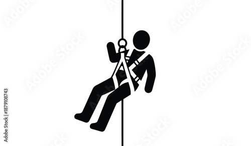 Black silhouette of a person rappelling with safety harness and rope