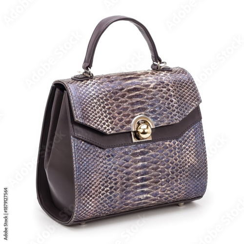 Bilde på lerret Stylish ladies' handbag with an iridescent blue snake skin embossed finish and a decorative gold-toned sphere clasp, isolated on white background for fashion e-commerce catalogs