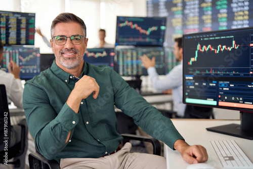 Photography Smiling mature business man crypto broker, financial investor, trader or expert adviser at work, portrait