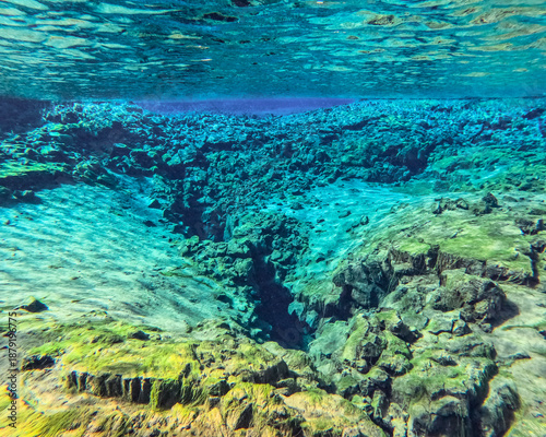 Silfra is a fissure between the North American and Eurasian tectonic plates in Thingvellir National Park, Iceland, 