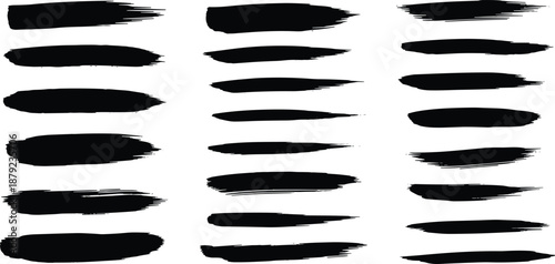 Collection of black brush stroke elements with a dry and textured appearance, perfect for artistic and graphic design projects