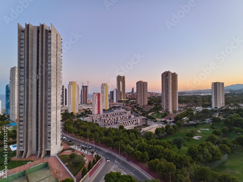 peaceful morning scene with city and coast, calm dawn overlooking residential area and tranquil