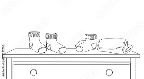 Line drawing of two pairs of socks and slippers on a wooden table isolated on white background
