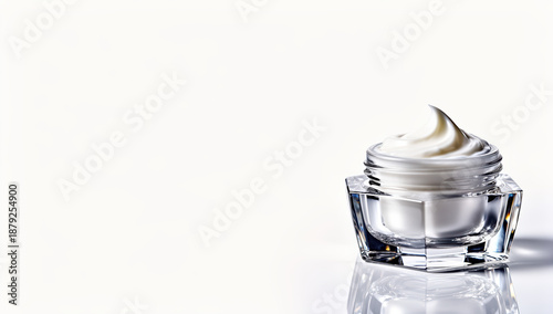 Cream jar with swirled texture on a minimalist background  