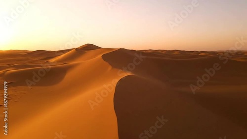 Desert Dunes at Sunset - A Serene Landscape of Sand and Light.