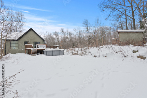 Beautiful winter landscape covered with fresh white snow, featuring pine trees and a clear blue sky. This image is perfect for travel, holiday, Christmas, New Year, nature background, seasonal design,
