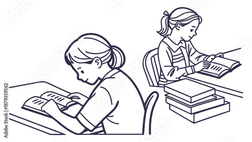 Two young girls studying with books in a quiet learning environment