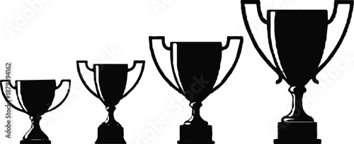 Set of black and white trophy cup silhouettes in different sizes isolated on white background showing success, achievement, victory and award concept for design projects