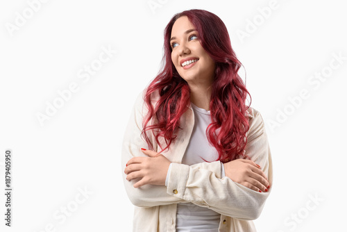 Young woman with red hair o...