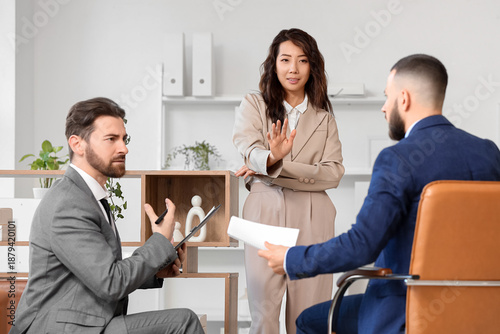 Female Asian court mediator...