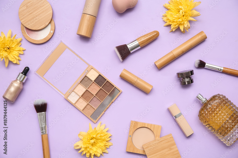 Obraz premium Composition with makeup products, accessories and flowers on lilac background