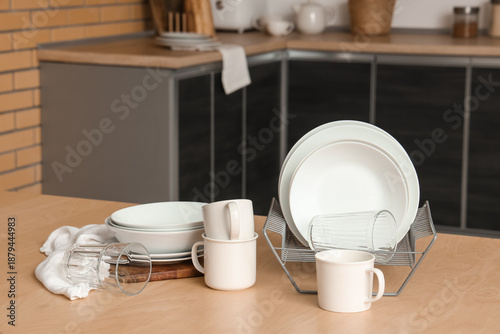 Set of clean dishes on wood...