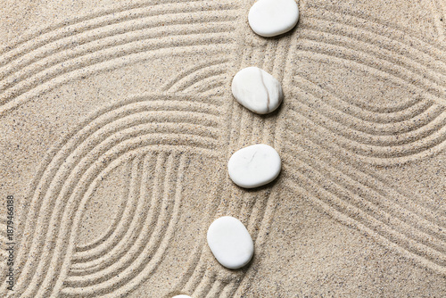 Canvas Print Spa stones on sand with lines. Zen concept