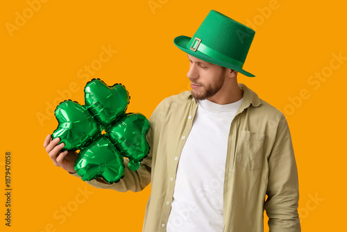 Young man in leprechaun hat...