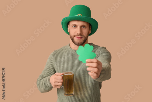 Young man in leprechaun hat...