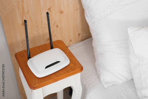 Modern wi-fi router on beds...