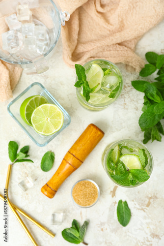 Glasses of cold mojito and ...