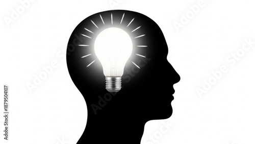 A silhouette of a person's head in profile with a glowing light bulb inside, symbolizing creativity and idea generation