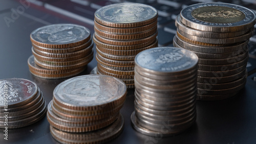 Closeup on  Coins of Thai bath currency and money finance 