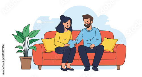 Happy young couple sitting comfortably on a red sofa in their living room while reading an interesting book together.