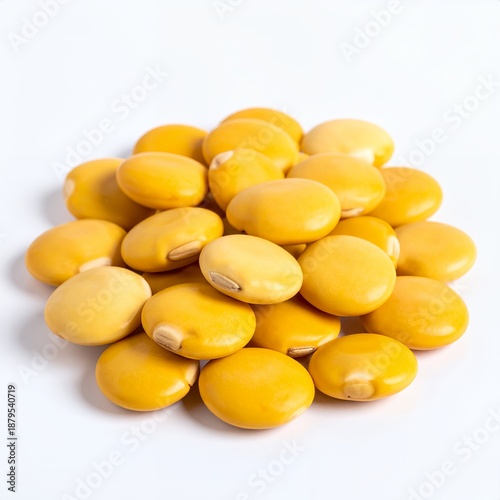A mound of golden lupin beans presented against a stark white background