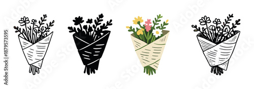 Colorful bouquet illuminated among darkened floral arrangements