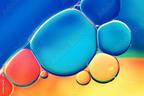 Water bubbles abstract colorful background, orange blue color water drops macro as natural background.