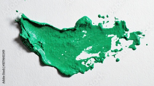 Emerald Green Paint Swash on Textured Gray Surface Under Bright Studio Lighting Emphasizing Brushstroke Detail and Viscosity with a Modern Artistic Aesthetic