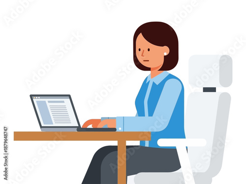 Woman working at a desk on a laptop computer