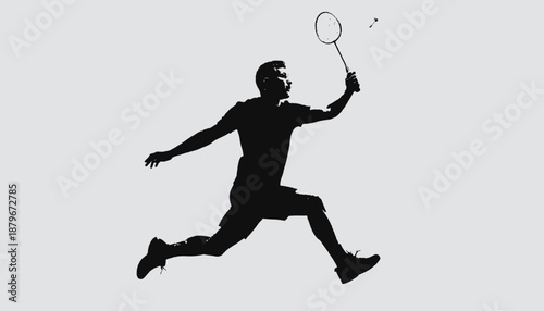 Black silhouette of a badminton player in action, striking the shuttlecock during a match