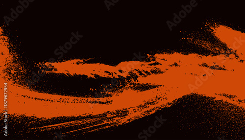 Abstract expression of a fiery orange paint stroke across a dark black background