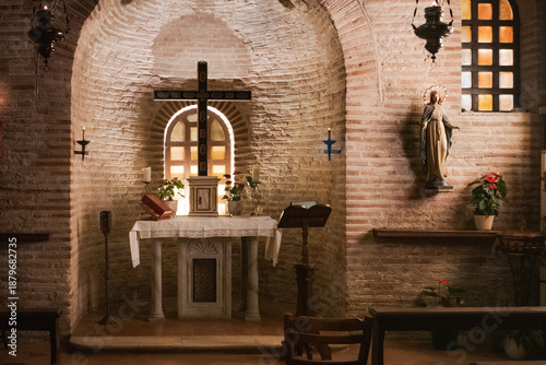 Ornate Byzantine apse mosaic and religious interior of the Basilica of Sant'Apollinare in Classe in Ravenna, Italy.