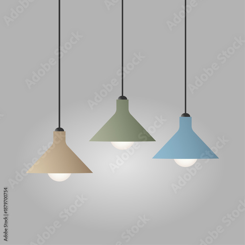 Three creative pendant lamps in green, beige, and blue on a gray background.