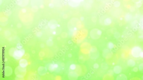 Green and yellow fresh natural bokeh light.Abstract soft glowing light.Spring background.Loop video.      緑と黄色　玉ボケ　ループ動画　爽やか　キラキラ　パーティクル　木漏れ日　パステルカラー　おしゃれ　