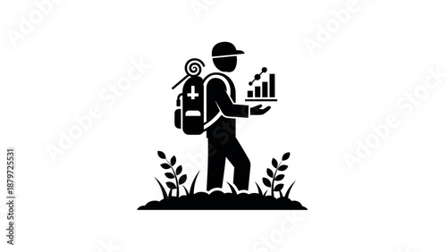 Wilderness explorer analyzing growth data in nature