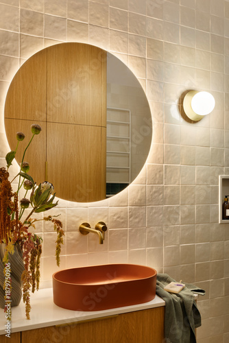 Tableau sur toile Modern Bathroom Interior with Round Mirror and Terra Cotta Sink