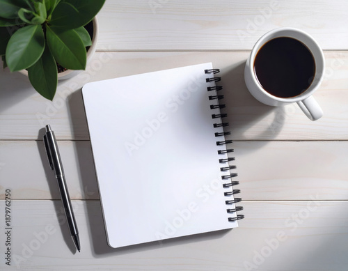 Minimalist Workspace With Notebook, Pen and Coffee