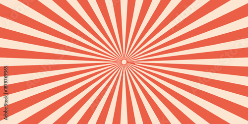 A striking radial pattern of orange and cream colored lines emanating outwards