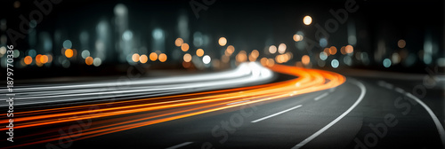 Night highway with long exposure effect. Bright light trails from car headlights against the background of blurred city lights. Traffic dynamics, speed and modern infrastructure.