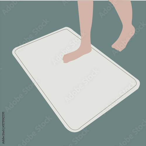 feet on the doormat.wet feet stepping out from doormat.wet bare feet cleaning on doormat