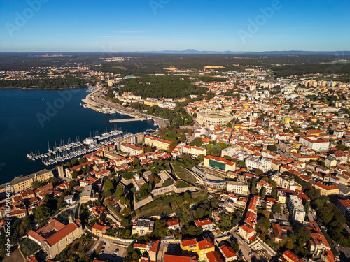 Obraz na plátně Pula city panorama and bell tower - aerial drone view, Croatia