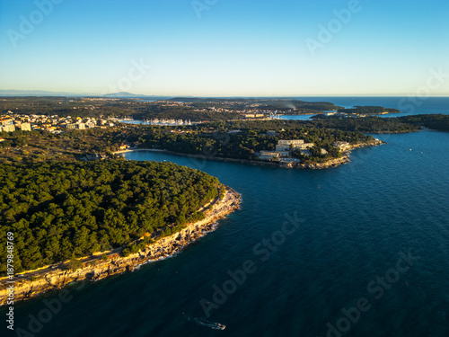 Fotografie Pula Croatia aerial drone view of island coastline Adriatic sea bay and moored boats