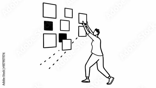 Man pulling multiple square-shaped objects towards himself with both hands