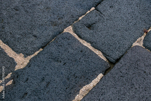 Lava Stone TilesVolcanic Lava Paving Tiles. Natural, durable paving. Features a unique black texture. Made from lava stone. Organic materials. Creates a durable surface.