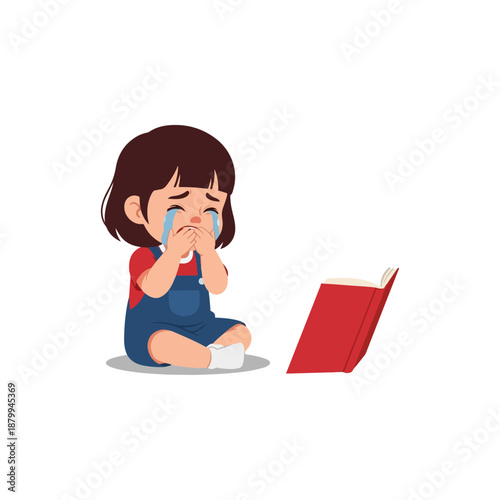 Sad little girl crying with book.