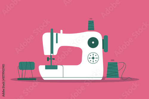 A sewing machine sits ready for a project with spools of thread.
